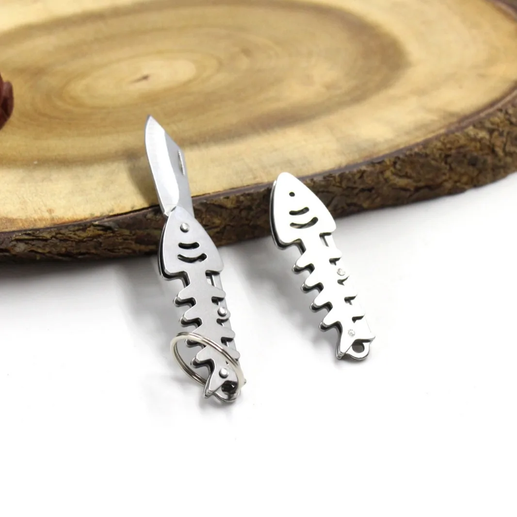 kf-S70929521e38d41de8320b82ace961899A Mini Outdoor Folding Knife Creative Fish Bone - Image 1