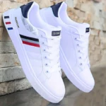 A Pair of White Sneakers, Perfect for Skateboarding, Casual Sports, And Everyday
