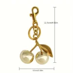 Golden Cherry Keychain Charm - Shiny Resin & Metal Bag Accessory, Elegant Gift tion - Image 2