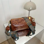 Retro Embossed Flower Leather Shoulder Bag, Classic Cylinder Crossbody Bag - Image 2