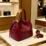 2026 New Light Luxury Drawstring Bucket Bag Trendy Gold Letter Handheld - Image 2