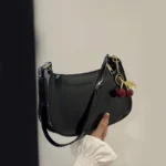Women's PU Leather Handbag Versatile Fashion Solid Color Cherry Pendant Shoulder - Image 2