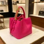 2026 New Light Luxury Drawstring Bucket Bag Trendy Gold Letter Handheld