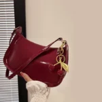 Women's PU Leather Handbag Versatile Fashion Solid Color Cherry Pendant Shoulder